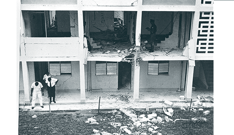 Damage to Housing and Development Board flats after a bomb explosion at Jalan Rebong on 12 April 1964. Ministry of Culture Collection, courtesy of National Archives of Singapore.